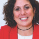 Amy Evans, director of special education programs for Syracuse schools, smiles for the camera.