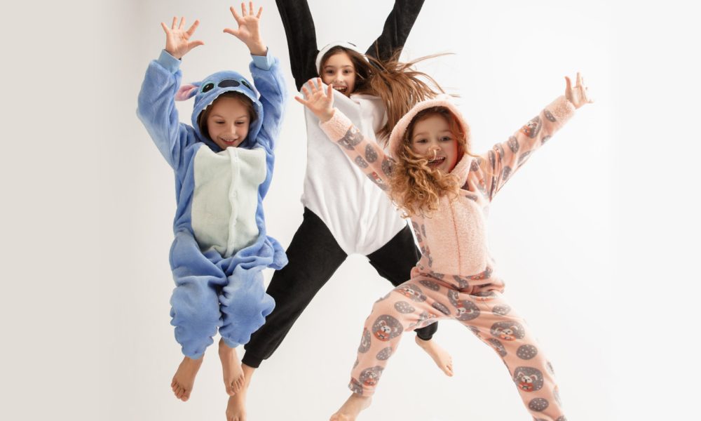 Kids in pajamas jumping